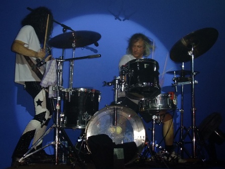 Adam Bomb playing guitar and drums with Bobby Reynolds