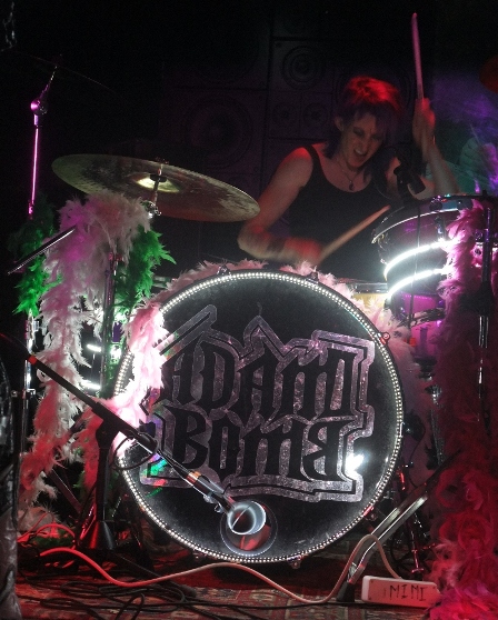 Violet The Cannibal on drums with Adam Bomb