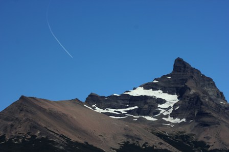 A plane near one of the peaks around PPerito Moreno Glacier