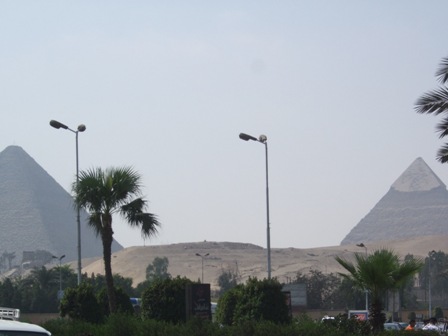 Giza street with the pyramids