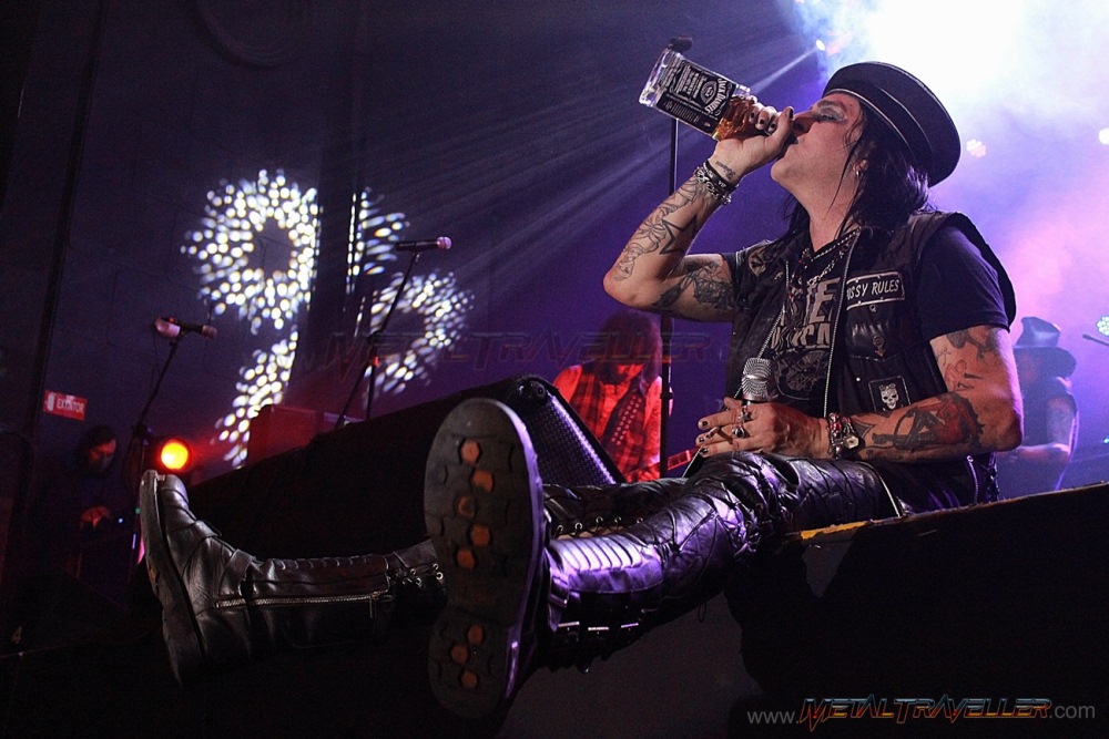 Taime Downe from Faster Pussycat drinking Jack Daniels