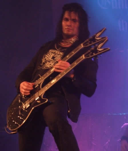 Michael Weikath playing guitar with Helloween