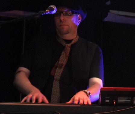 Keith Weir playing keyboards with The Quireboys