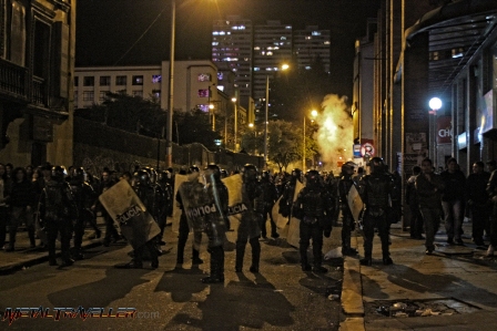 The ESMAD special forces firing tear gas grenades