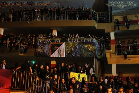 Warcry fans and their band flags in Bogotá